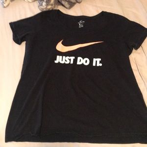 salmon pink and black nike shirt